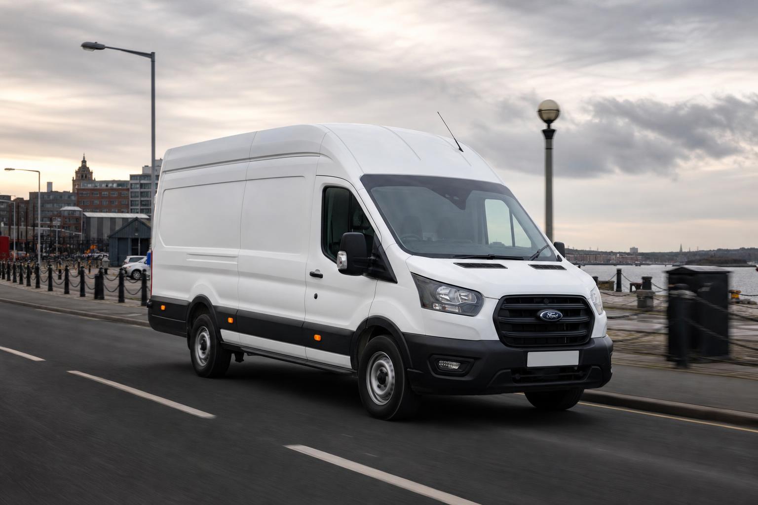 CM Logistics van driving through Liverpool at dusk